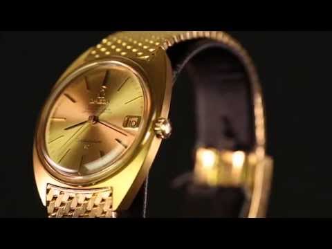 omega constellation gold watch