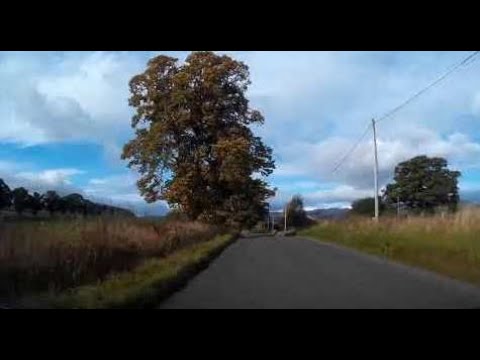 Autumn Road Trip Drive Through Lower Glen Almond On Visit To Perthshire Scotland