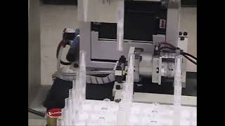Automatic Vial Filling, Stoppering, And Labeling Robot
