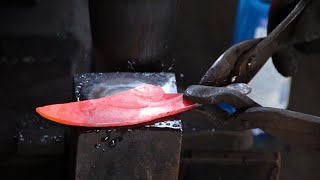 The process of making Japanese sickles and knives. A blacksmith shop with a history of 100 years