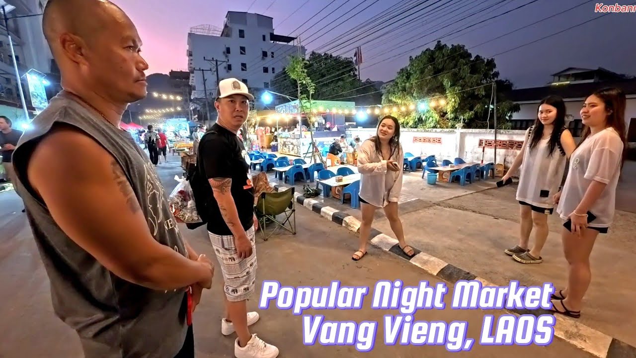 Walking the popular night market with American friends in Vang Vieng, Laos.