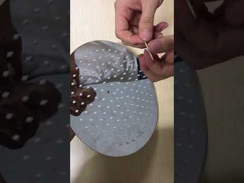 How to clean the nozzles of rainfall shower head