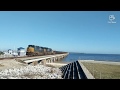 Csx combo rail  freight train with a baltimore  ohio caboose at bay st louis miss