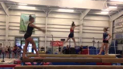 2014 Eleni Karras-Front Tuck on beam- Level 10