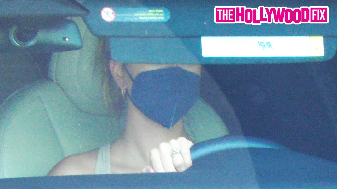 Hailey Bieber Tries Her Hardest To Hide From Paparazzi While Leaving Her Morning Workout At DogPound