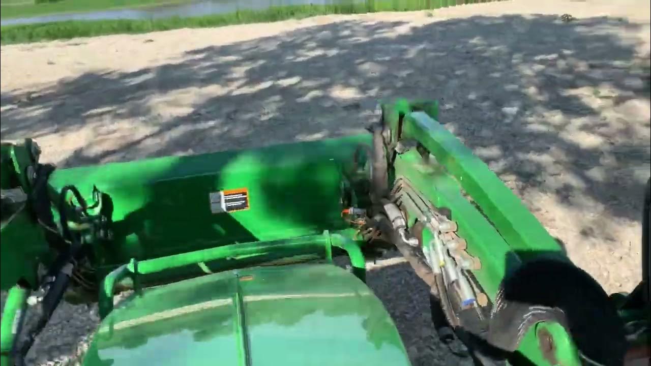 Turbocharged John Deere 2025R pulling land plane in high range! YouTube