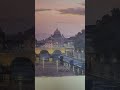 Watercolor painting of rome at twilight lights of the city have come on and sunset is in view