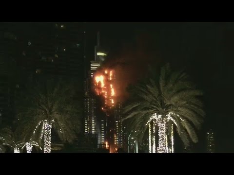 Dubai high rise burning near New Year's Eve fireworks display