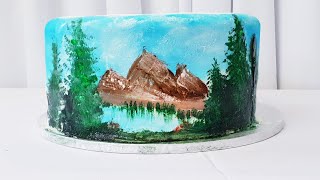 I followed a Bob Ross painting tutorial on a cake in food colouring