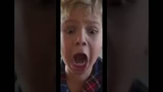 Child flips out after getting a rainbow charizard card