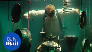 Listen to the world's first UNDERWATER band in Netherlands - Daily Mail