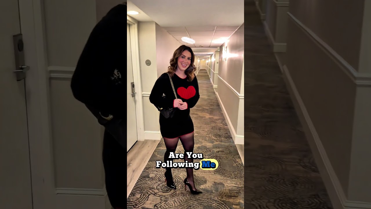 A little black dress with a bold red heart—elegant yet playful 