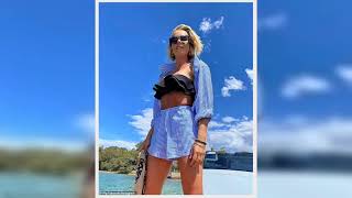 Pip Edwards and Michael Clarke enjoy a day out on Sydney Harbour