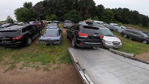 HOW TO UNLOAD A CAR FROM A FLATBED TOW TRUCK, IF IT