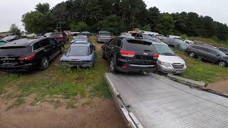 HOW TO UNLOAD A CAR FROM A FLATBED TOW TRUCK, IF IT'S STUCK