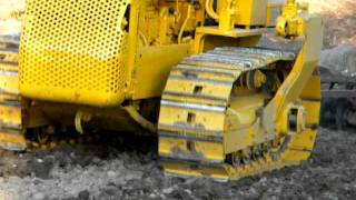 Caterpillar D2 pulling a Case disk