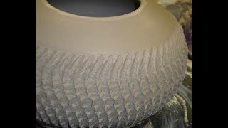"Roulette Gear" technique for diverse and quick surface texture using the potter's wheel.