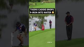 Tiger Woods Caddy Drops 9-Iron Into The Water