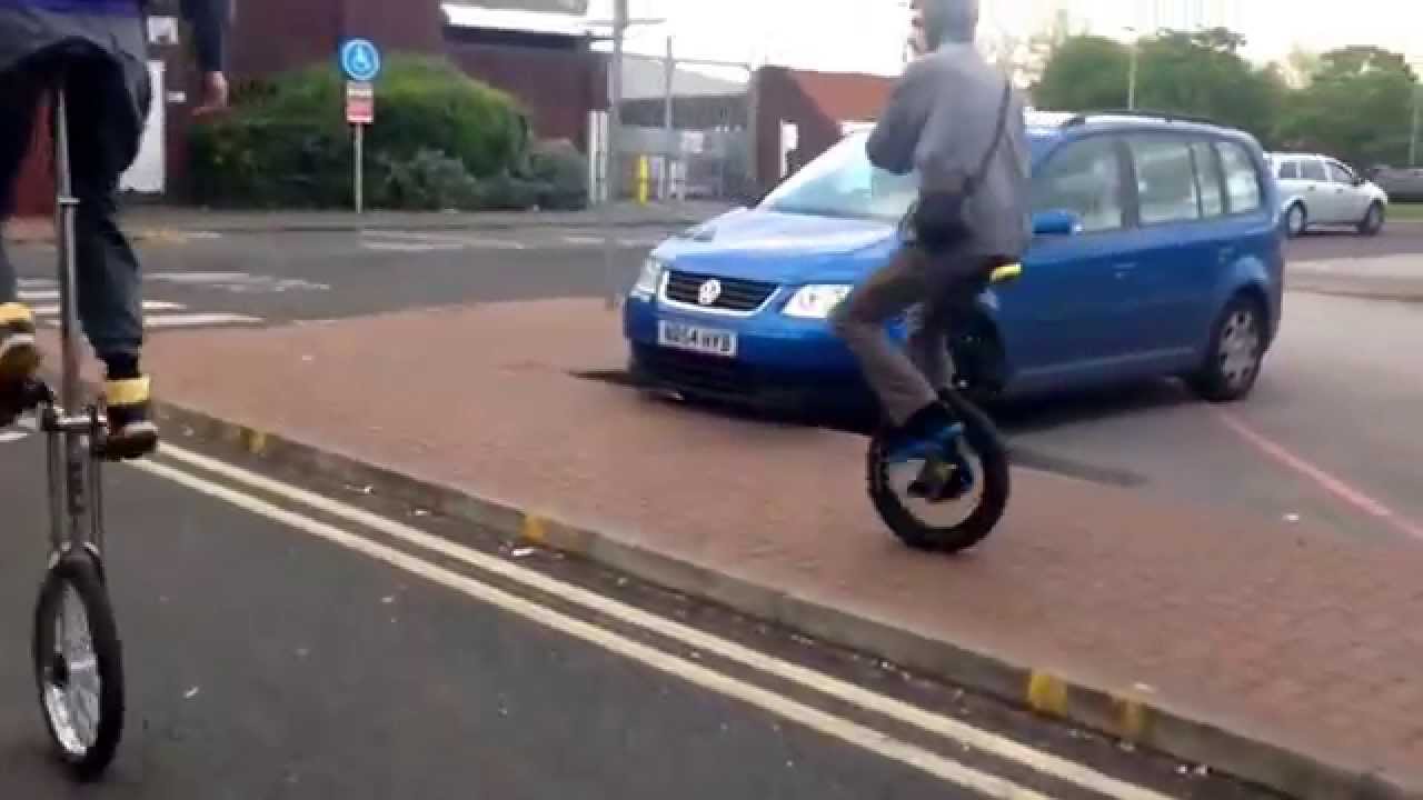 Manc Unicycles Tour de Moston With a 5ft Giraffe Unicycle
