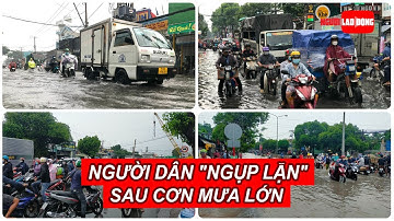 Người dân nhiều nơi ở TP HCM, Bình Dương "ngụp lặn" sau cơn mưa lớn | Báo Người Lao Động