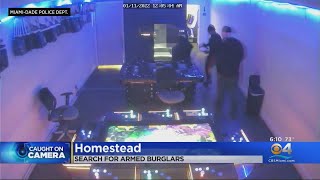 Police Release Video Of Two Suspects Wanted For Shooting Man During Business Burglary