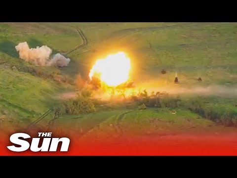 Russian tank is blown to pieces while manoeuvring away on the battlefield