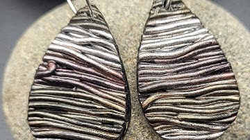 Surface texture on polymer clay with extruder and metallic alcohol inks