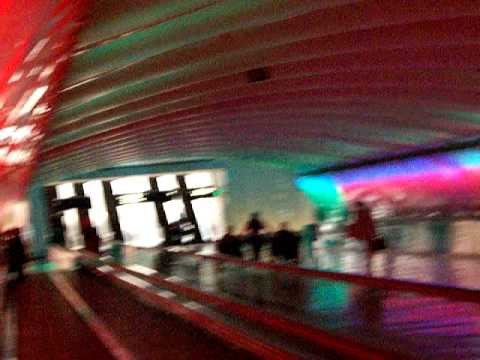 Quirky installation of light & music between concourses at Detroit Metropolitan Wayne County Airport. The Light Tunnel connects the McNamara Terminal's Concourse A with Concourse B/C. A nice bit of fun during an otherwise banal layover!