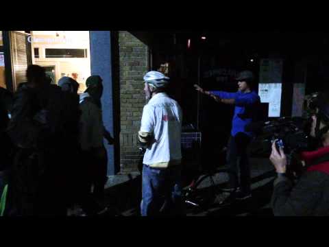 Man with hammer strikes activist during protest, 12/7/14