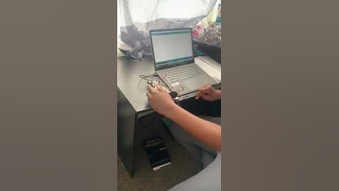 The door alarm system controlled by the combination of ESP32, push button and speaker