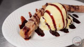 Churro w/ Vanilla Ice Cream at the Pier Seafood in Norfolk, Nebraska