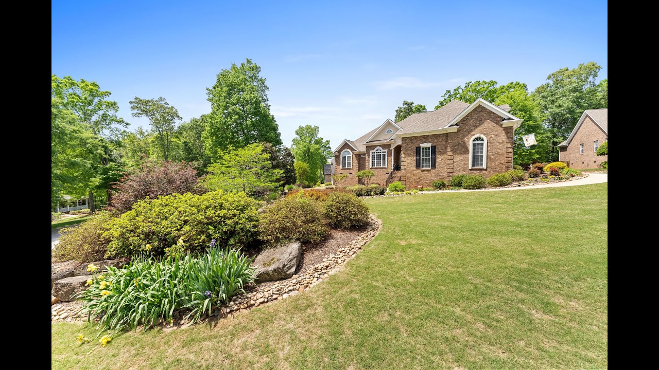 Stunning custom brick home on over half acre lot; main floor primary bedroom; Greenville County, SC