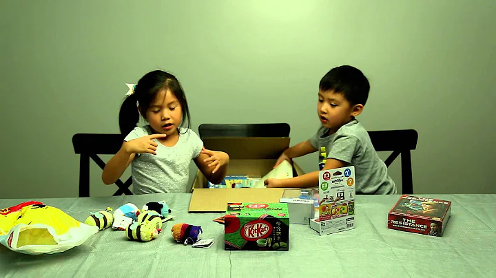 Isabelle & Benjamin - Opening a care package from ...