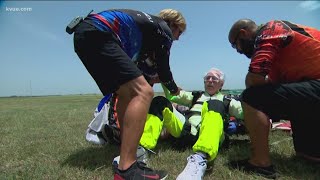 103-year-old skydives for his grandkids' graduation | KVUE