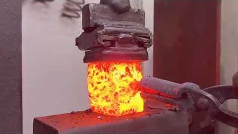 cut Forging Two Extreme Knives From a Rusty Chain and a Drill Bit
