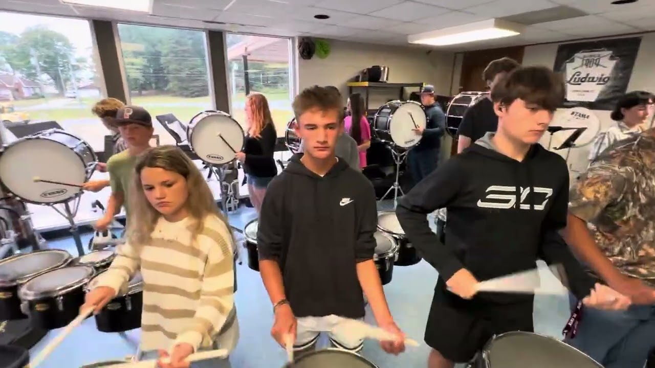 Fall 2025 Faith Academy Charter School drum line rehearsing “Winter Wonderland” for the parades