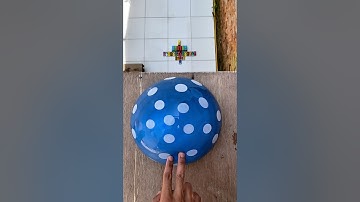 Experiment: Will this blue and pink polka dot water balloon explode if dropped from a height?