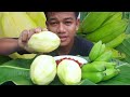 Eating mango  banana with spicy chili salt