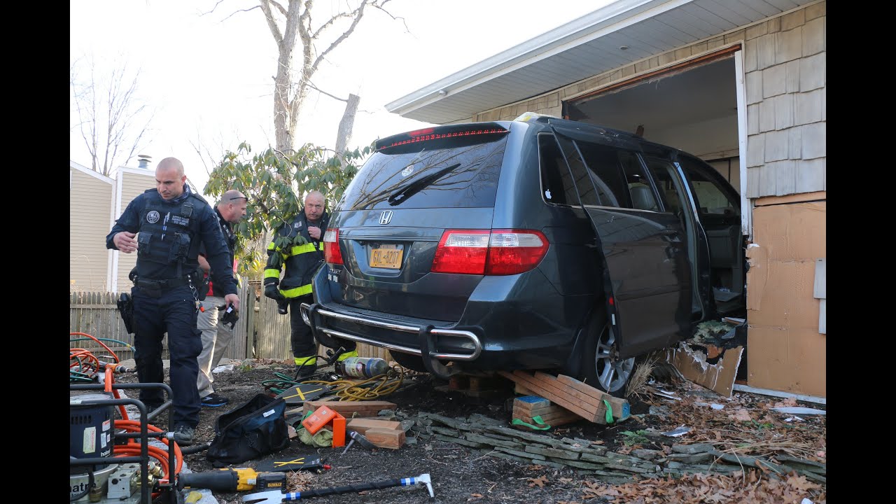 DRIVER CRASHES INTO HOUSE IN RONKONKOMA NY