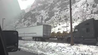 Snow snarls Colorado mountain traffic on I-70