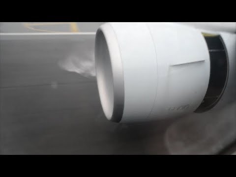 Boeing 777. GE90 Jet Engine. Reverse Thrust on Wet Runway. Hong Kong