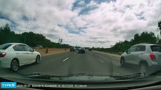 Distracted Driver Swerves and Nearly Causes Crash