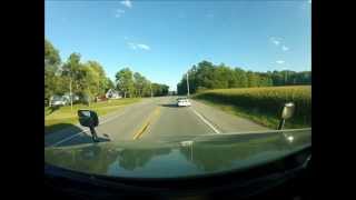 Driver with a death wish passes my truck on shoulder.