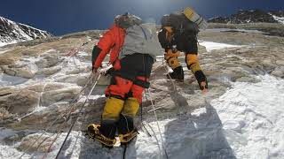 Climbing yellow band, a sedimentary sandstone rock band at 25000ft height, everest expeedition 2019