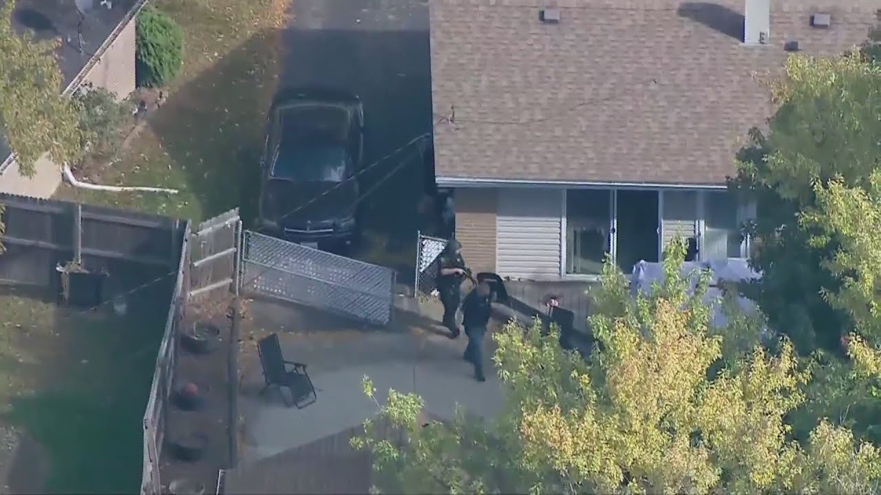 Suspect in custody after shooting at officers from inside Addison home