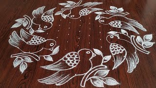 Sankarthi chukkala muggulu (11×6) dot's.. beautiful Bird's rangoli Sankarthi chukkala muggulu (11×6) dot's.. beautiful Bird's rangoli
