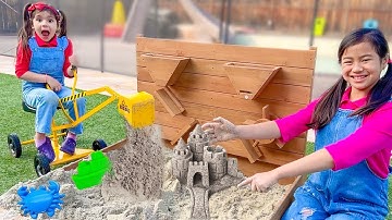 Jannie and Ellie Digging for Fossils and Treasure in the Sand with Diggers and Beach Sand Toys