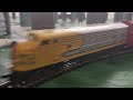 Santa Fe sharknose pulls nine HO Guage Rolling Stock.