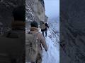 Snow Leopard Ambushes Two Hunters in Afghanistan’s Frozen Mountains