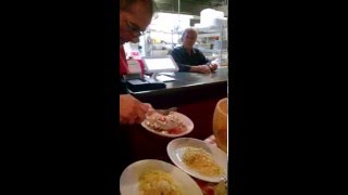 Pasta tossed in a Parmigiano Reggiano bowl